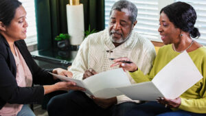 A financial professional meets with her clients to answer their nontax estate planning questions.