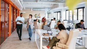 Modern Collaborative Office Space with Diverse Professionals Working in a Co-Working Environment