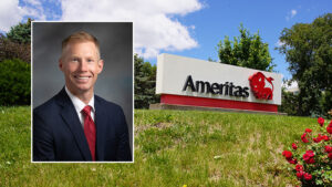 A professional headshot of Kelly Halverson, senior vice president, chief actuary and underwriting, in front of a photo of the Ameritas building at springtime.