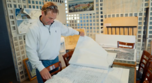 business owner reviewing floor plans